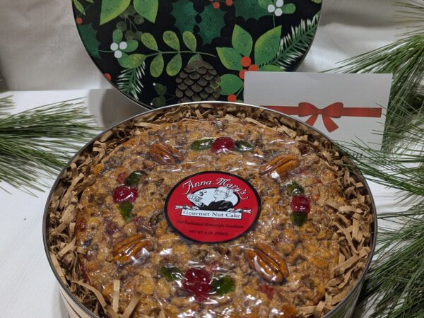 PXL_20251123_001235021 Five Pound Gourmet Nut Cake in Holiday Tin